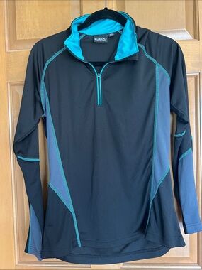 Performance Women's Long Sleeve Half-Zip Tee in Black with Teal Trim